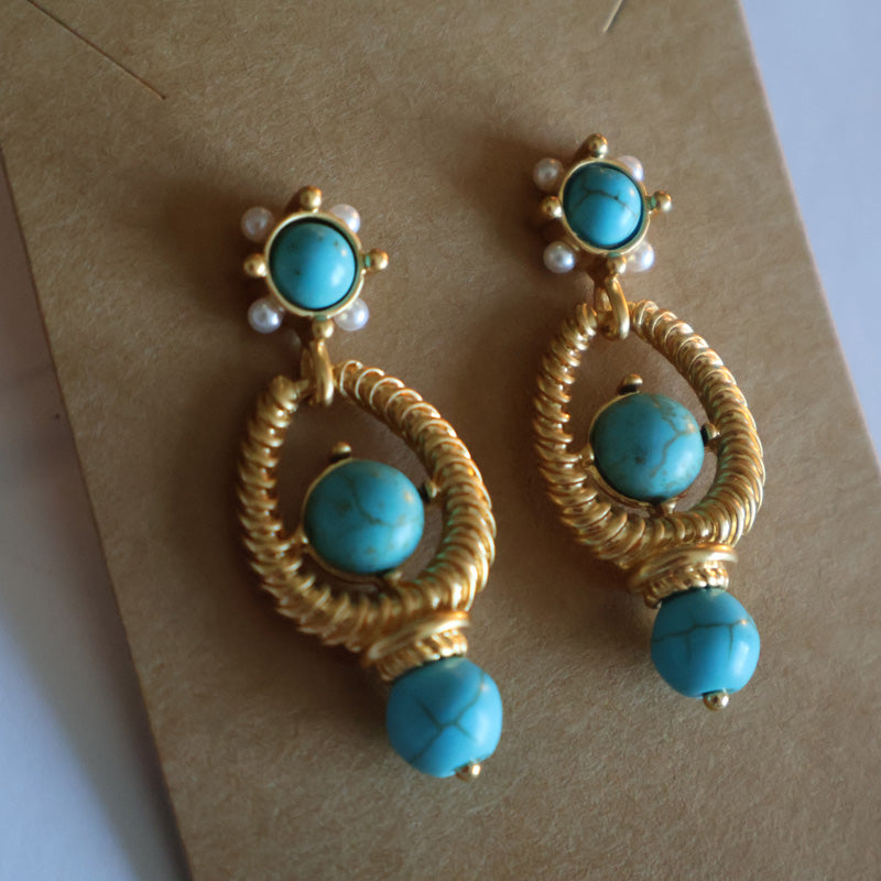Turquoise Vintage Style Earrings with natural turquoise beads and gold-plated accents.