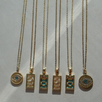 Taro Card Necklace with Cubic Zirconia embellishments in Moon and Empress designs, vintage-inspired, gold-plated.